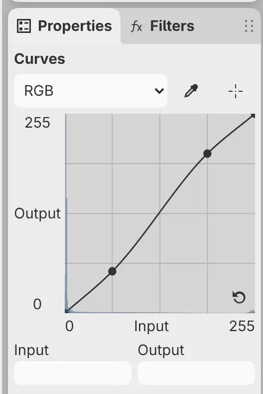 The Properties panel with an S-shaped RGB curve in Curves.