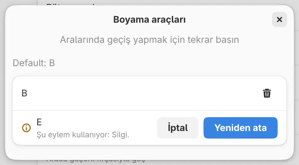 Başka bir komutun kullandığı tuşu yeniden atamayı öneren kısayol düzenleyicisi.