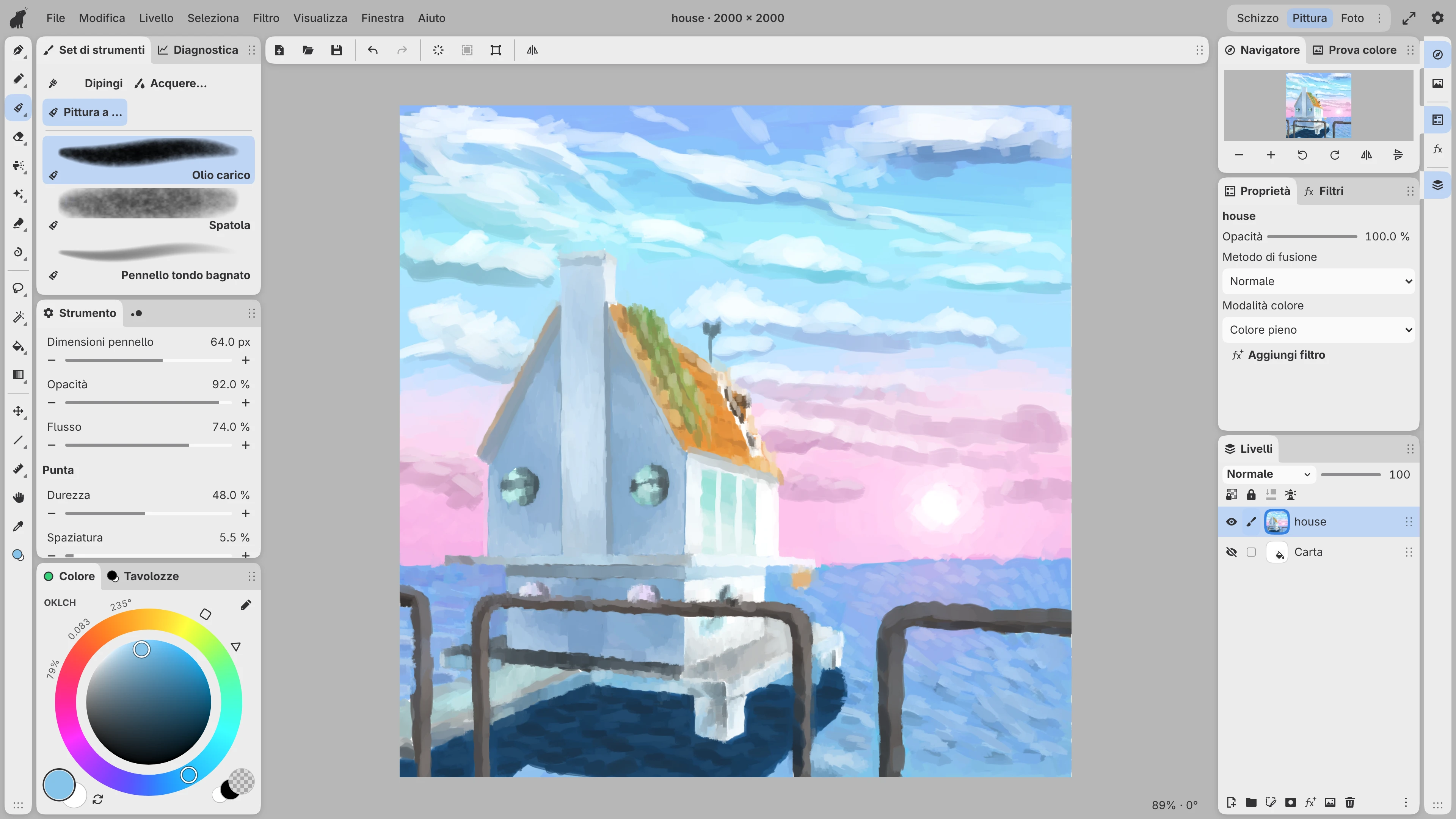 Un dipinto a olio di una casa al mare al tramonto nello spazio di lavoro Paint, con pennelli, colori e strati accanto alla tela.